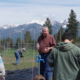 Virgil Dupuis, Extension Director for Salish Kootenai College, speaks with high school students in the college garden at NWAL Youth Day. May 3, 2018.
