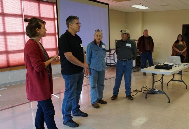 NWAL team members Meghan Collins, Derek Kauneckis, Anna Eichner, Scott Goode, Virgil Dupuis (SKC) and Mary Rose Morigeu (Confederated Salish and Kootenai Tribes) welcome participants to Youth Day, May 3, 2018. 
